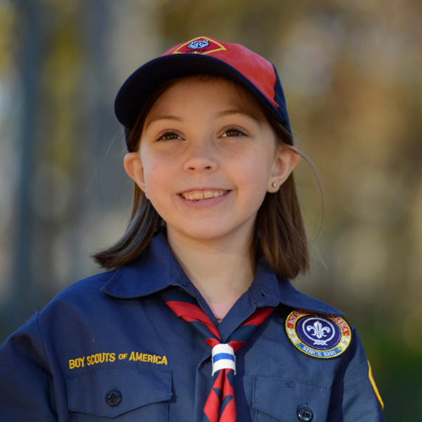 little girl scout smiling